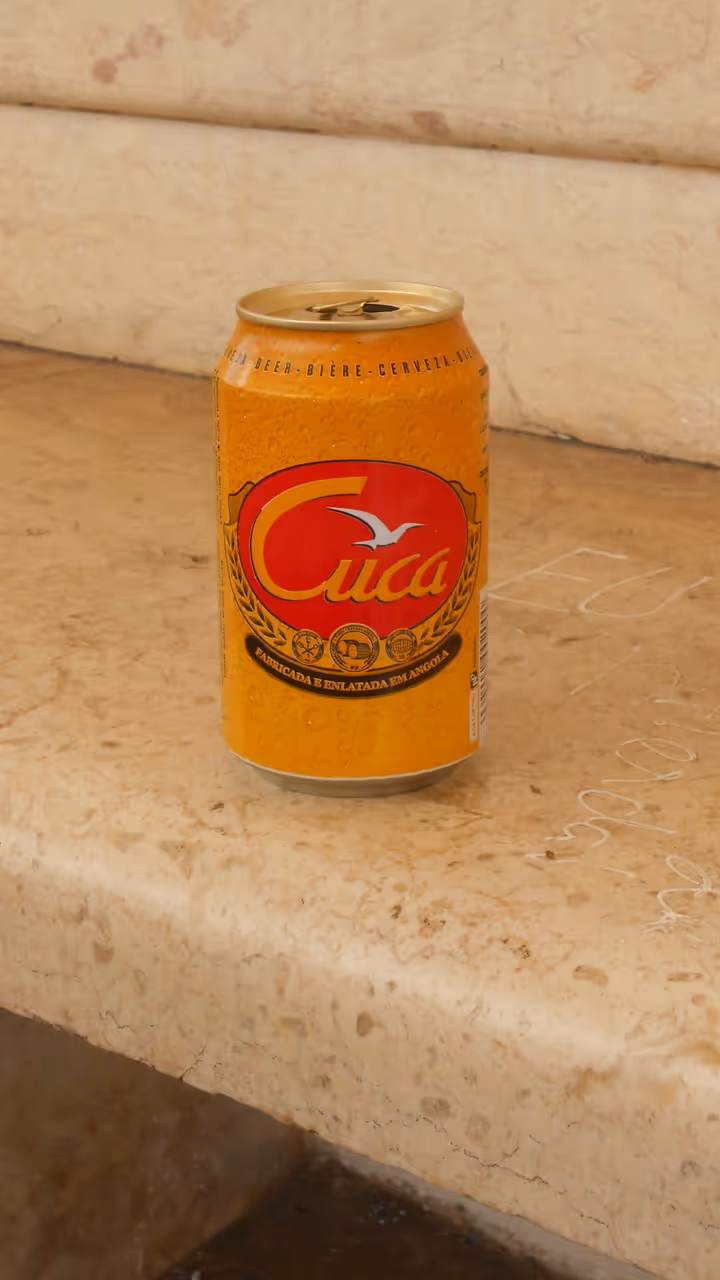 An empty tin of Angolan Cuca beer