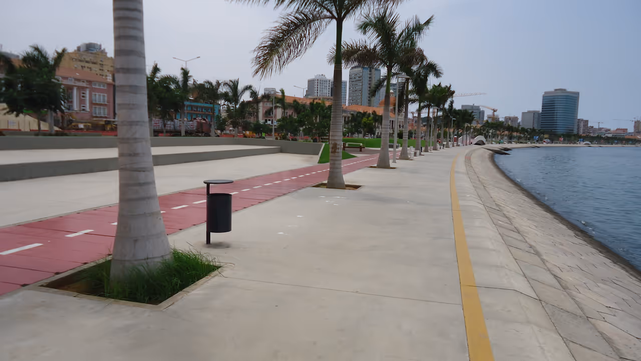 Walk the marginal promenade in Luanda