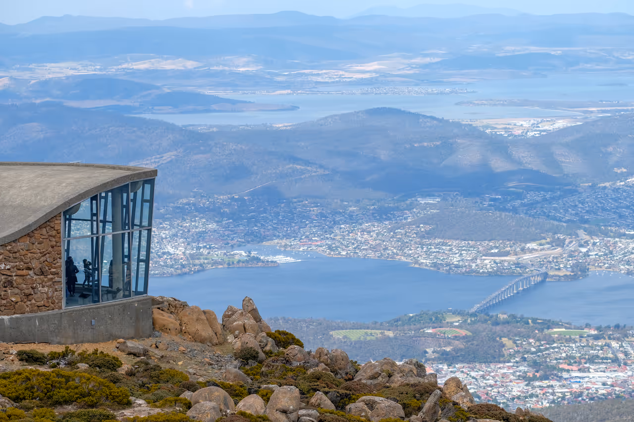 Looking out over the cityscape, river and bays of Hobart, Tasmania, from the summit of Mt Wellington.