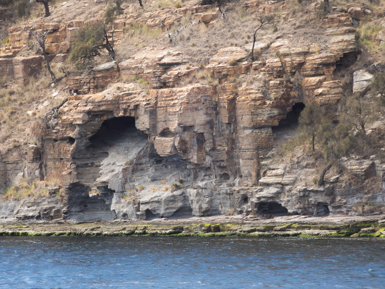 Caves in Bedlam Walls cliffs on the Derwent River