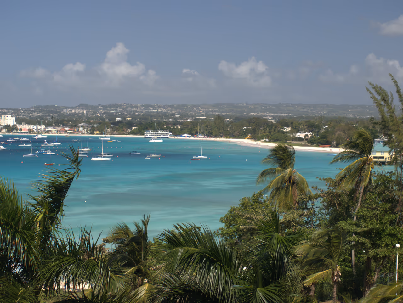 Carlilse Bay, Barbados, with Bridgetown to the left and the pier of Barbados Yacht Club visible through the trees to the right