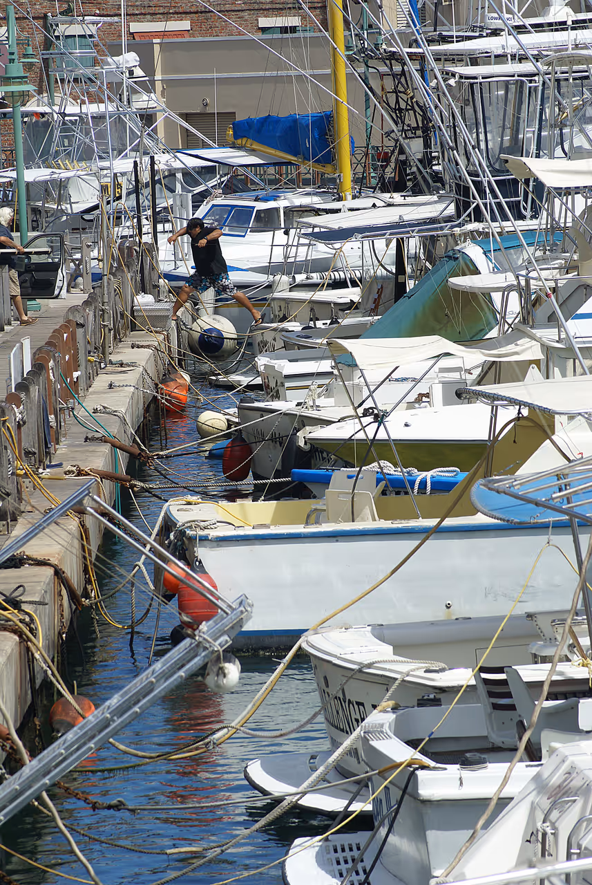 Telephoto shot of boats along the Careenage wharf in Bridgetown, Barbados