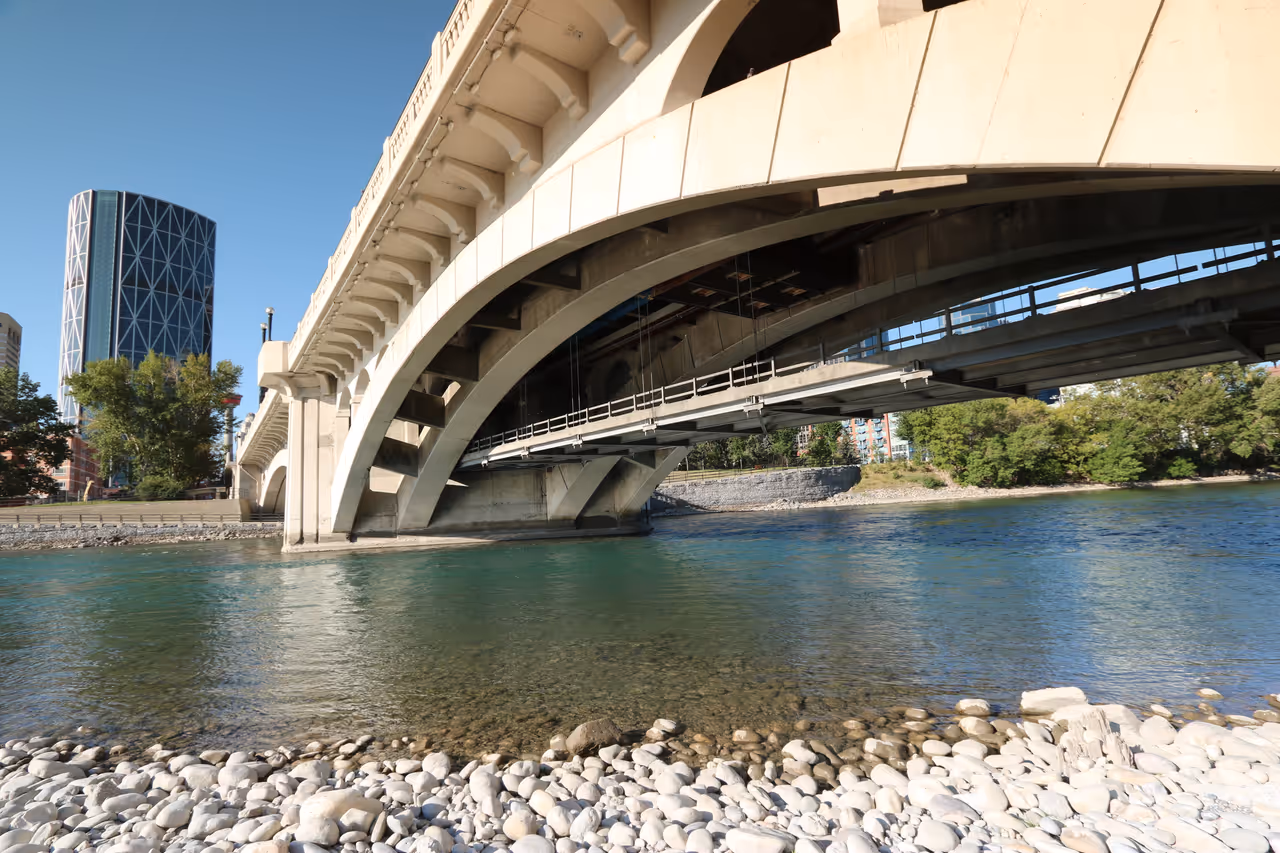 Low river under a bridge in calgary
