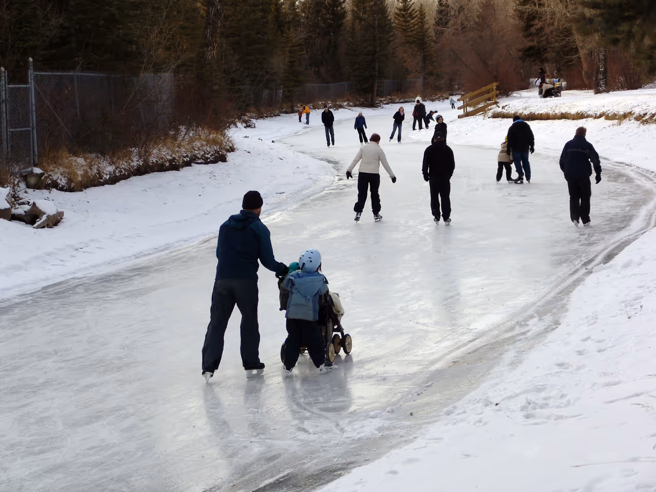 Ice skating on frozen River in Calgary Bowness Park