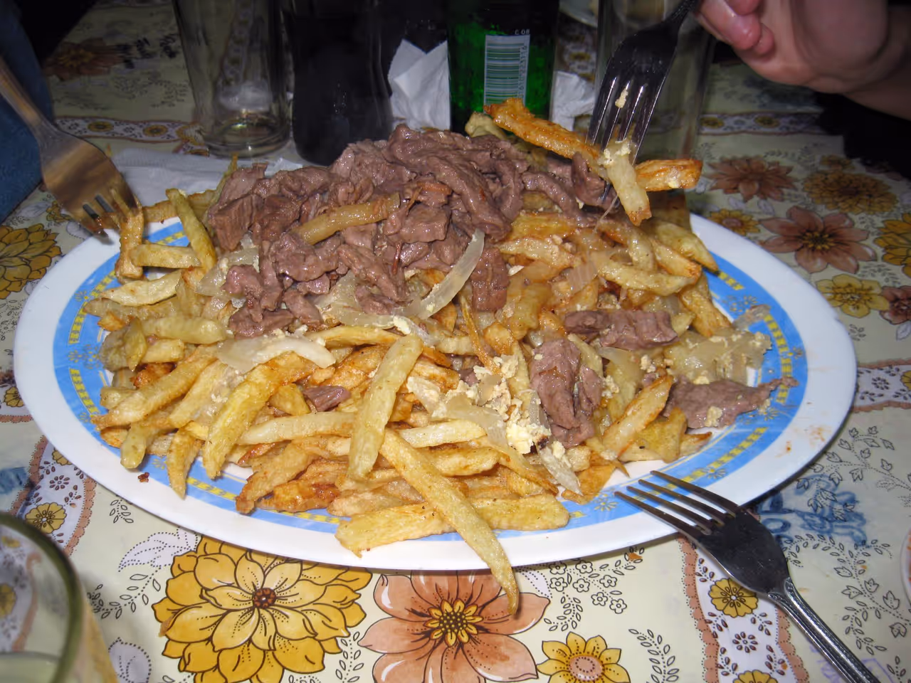Eating chorrillana at j cruz in Valparaíso