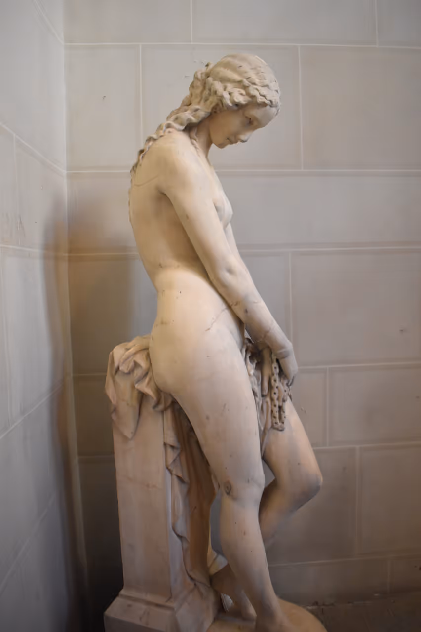 The marble statue Une captive by Pierre Hebert at the Musee des Beaux-Arts de Carcassonne