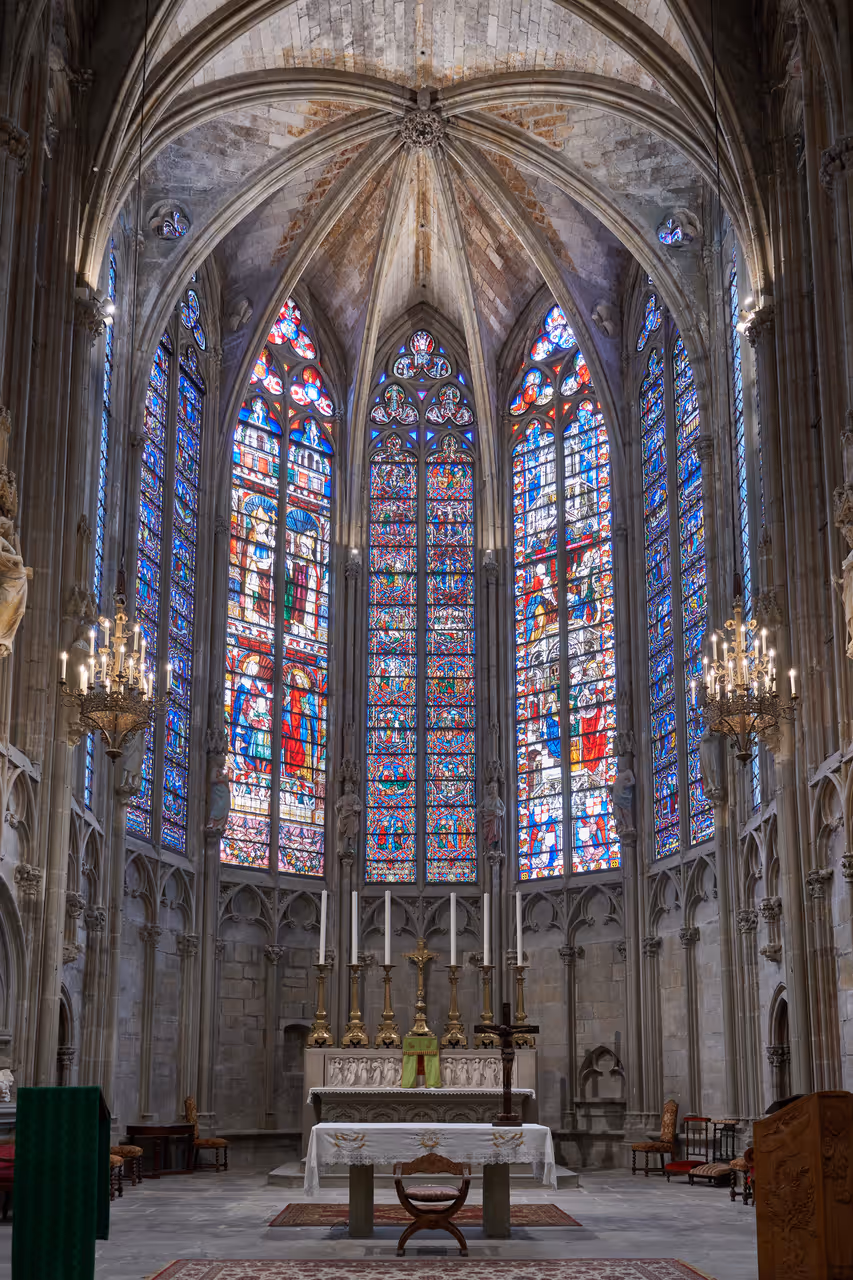 Gothic choir and stained glass windows inside the Basilica of Saints Nazarius and Celsus in Carcassonne