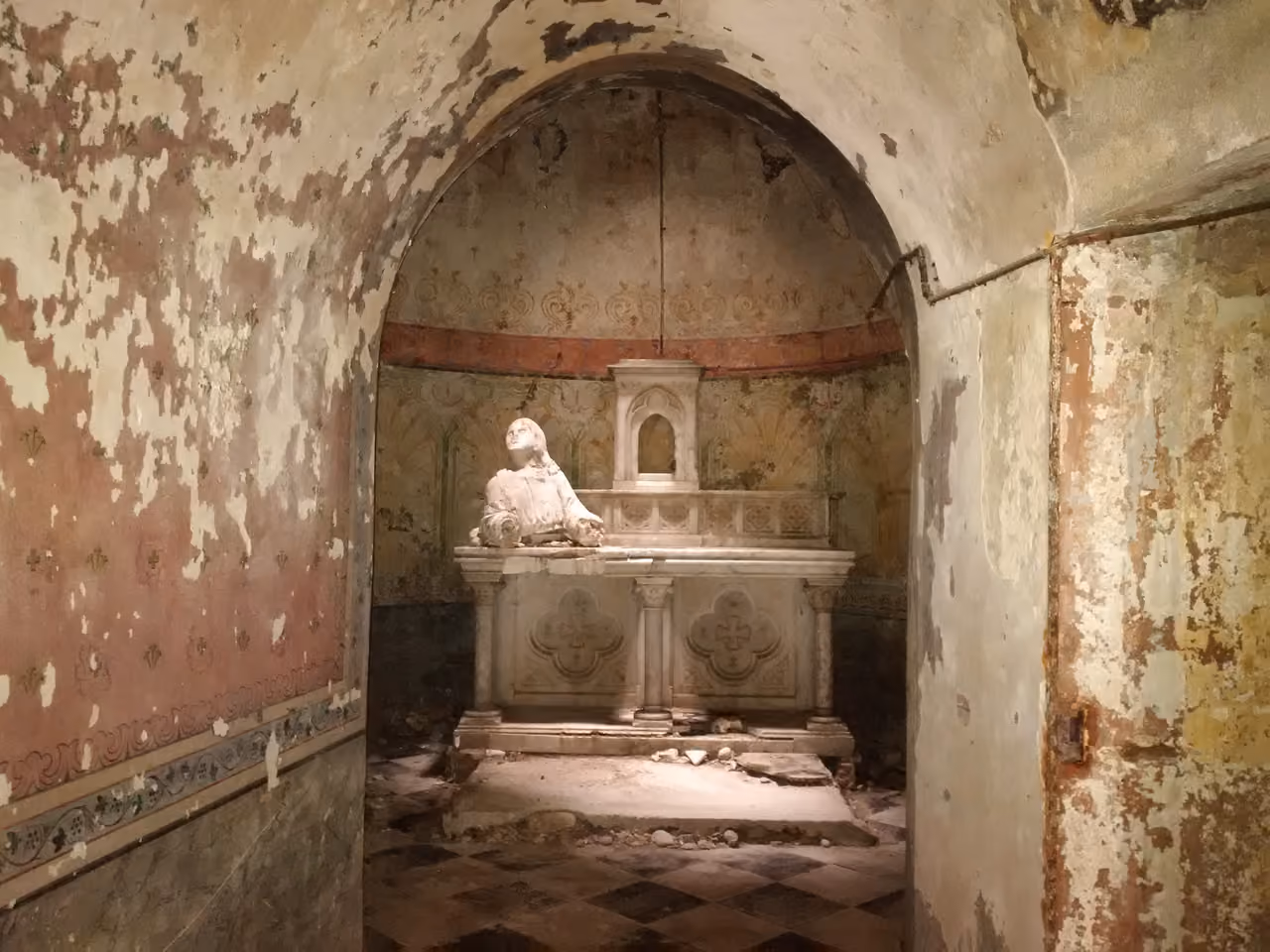 Underground stone chapel and altar at Jardin du Bastion du Calvaire