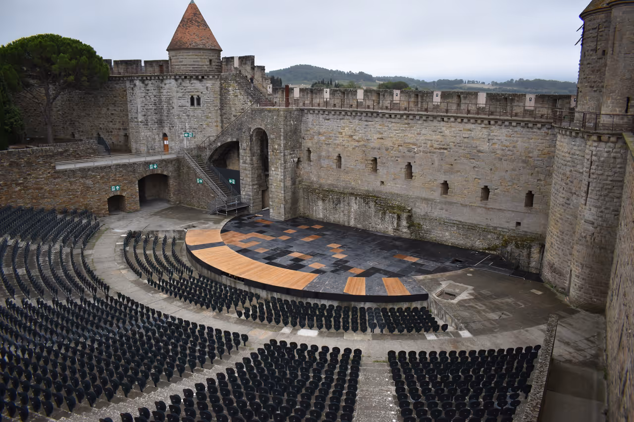 Open-air Théâtre Jean-Deschamps within the historic medieval stone walls of Carcassonne