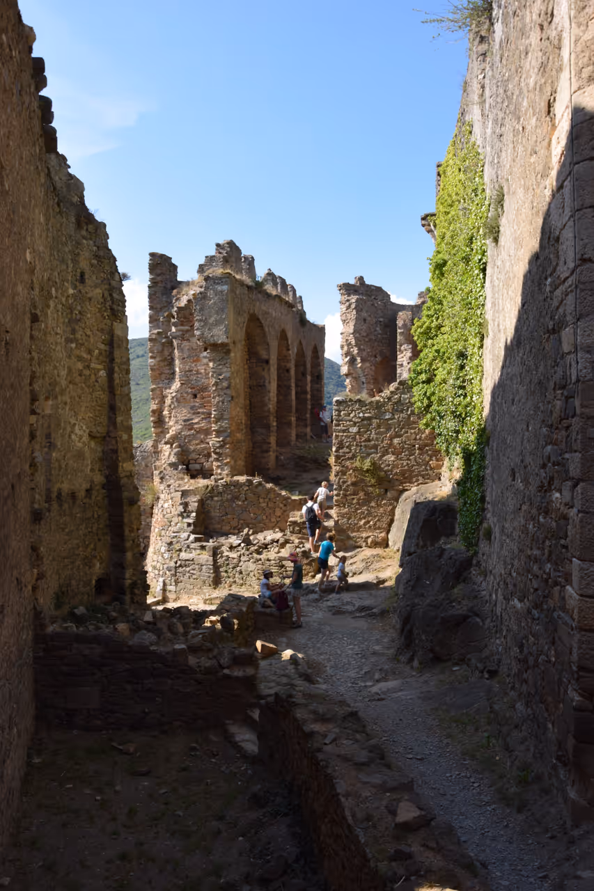 Stone ruins of the Castles of Lastours on a sunny day