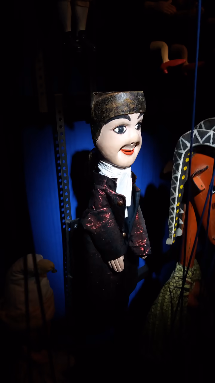 Traditional French Guignol hand puppet displayed at the puppet arts museum
