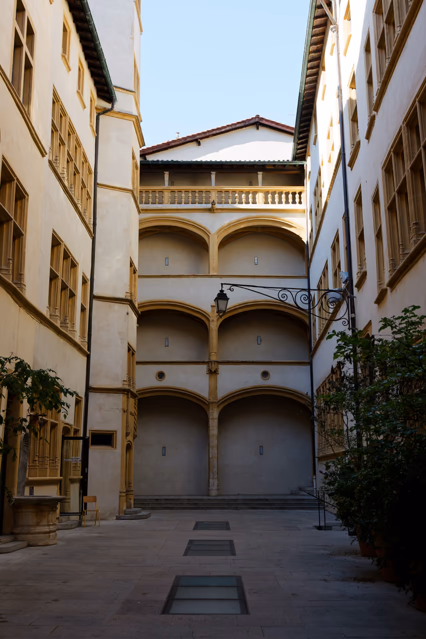 Inner courtyard of the historic Hotel de Gadagne museum showing Renaissance architecture and stone galleries