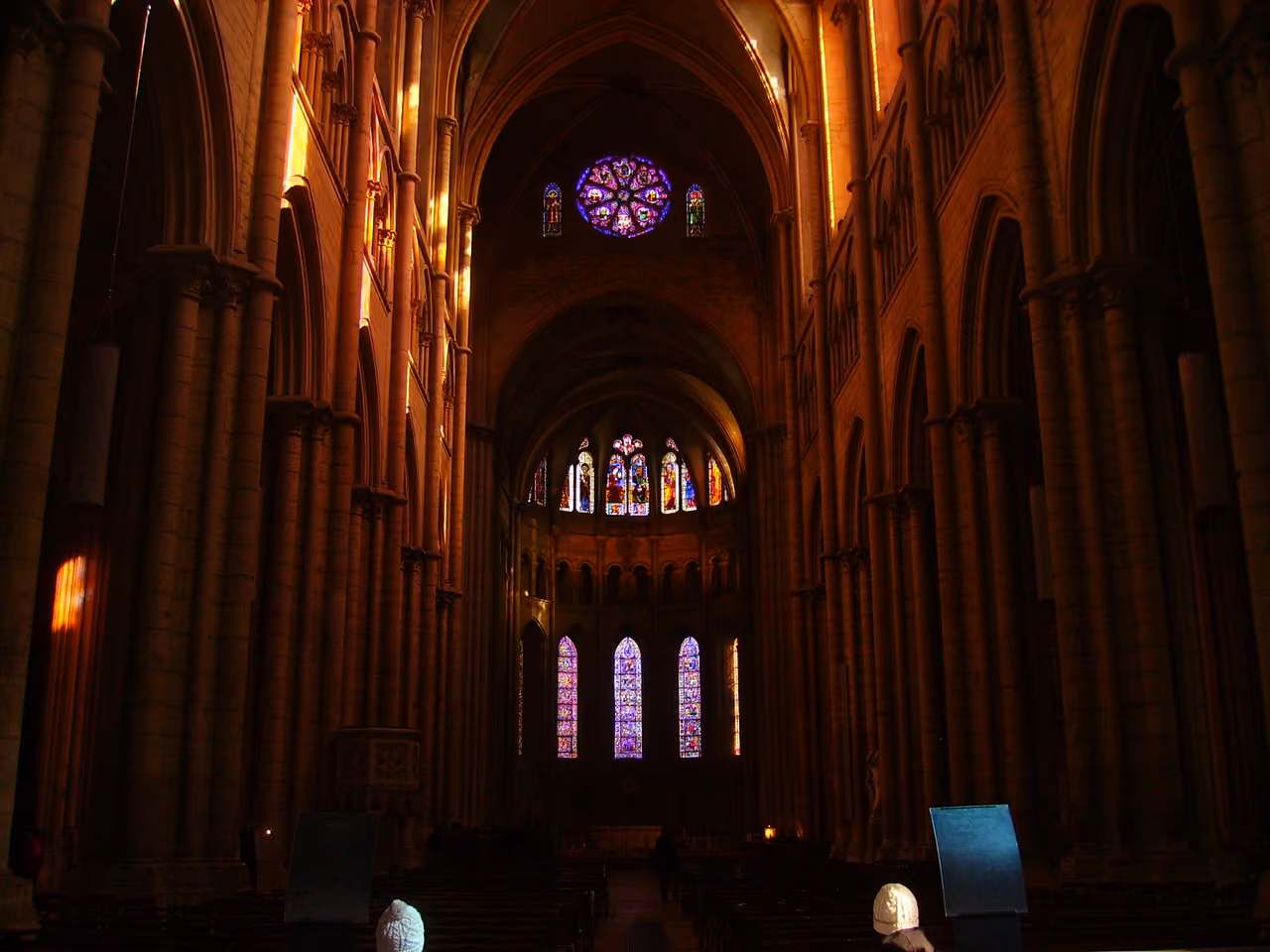 Interior of Lyon Cathedral showing the nave and stained glass windows
