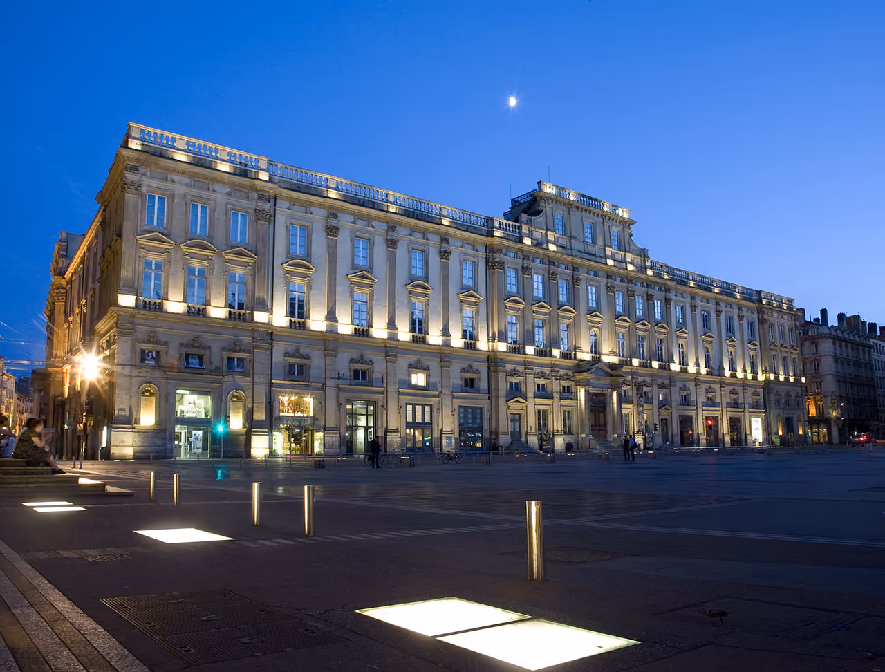 Illuminated facade of the Museum of Fine Arts at night from Place des Terreaux