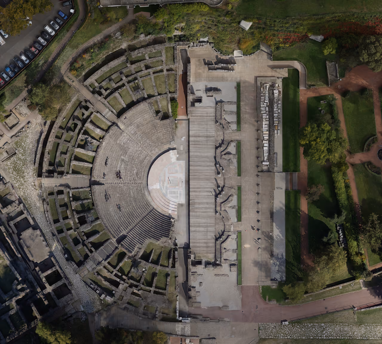 Aerial view of the ancient Roman theatre of Fourvière with stone semi-circular seating and stage foundations