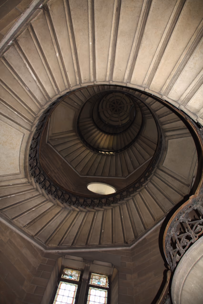 Spiral staircase looking up inside the Tour de la Justice at the Basilique Notre-Dame de Fourviere