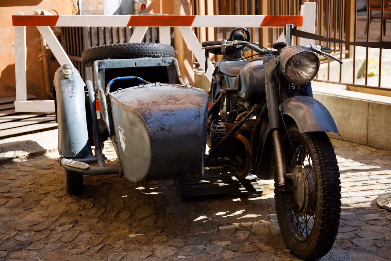 Vintage motorcycle with sidecar replica from Indiana Jones at Musée Miniature et Cinéma