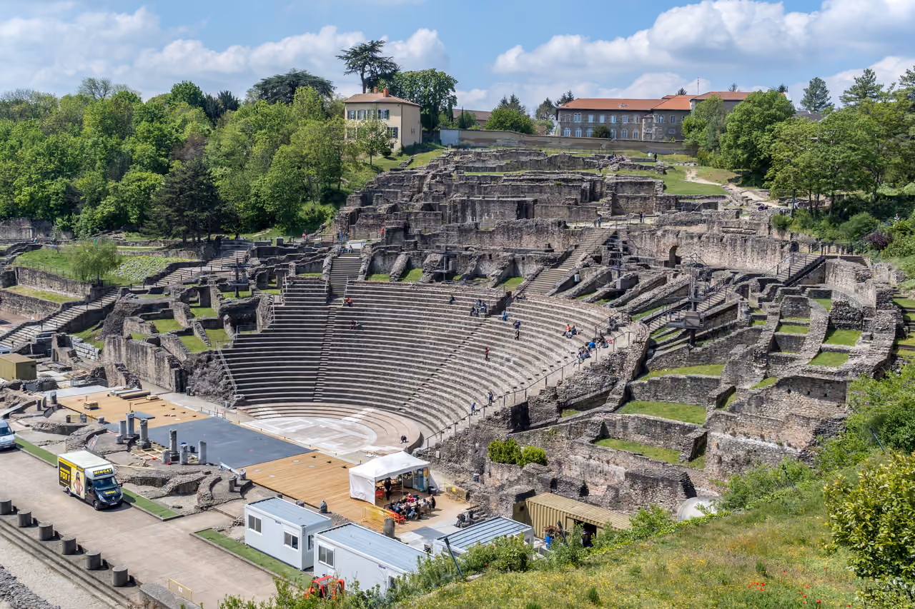 Ancient Roman theatre of Lugdunum ruins on a green hillside