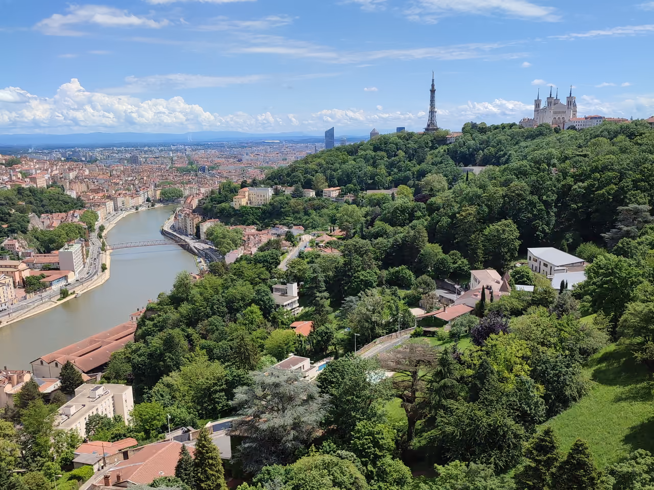 Panoramic view of Lyon showing the Saône river, Fourvière hill with the Basilica of Notre-Dame de Fourvière and Tour Métallique