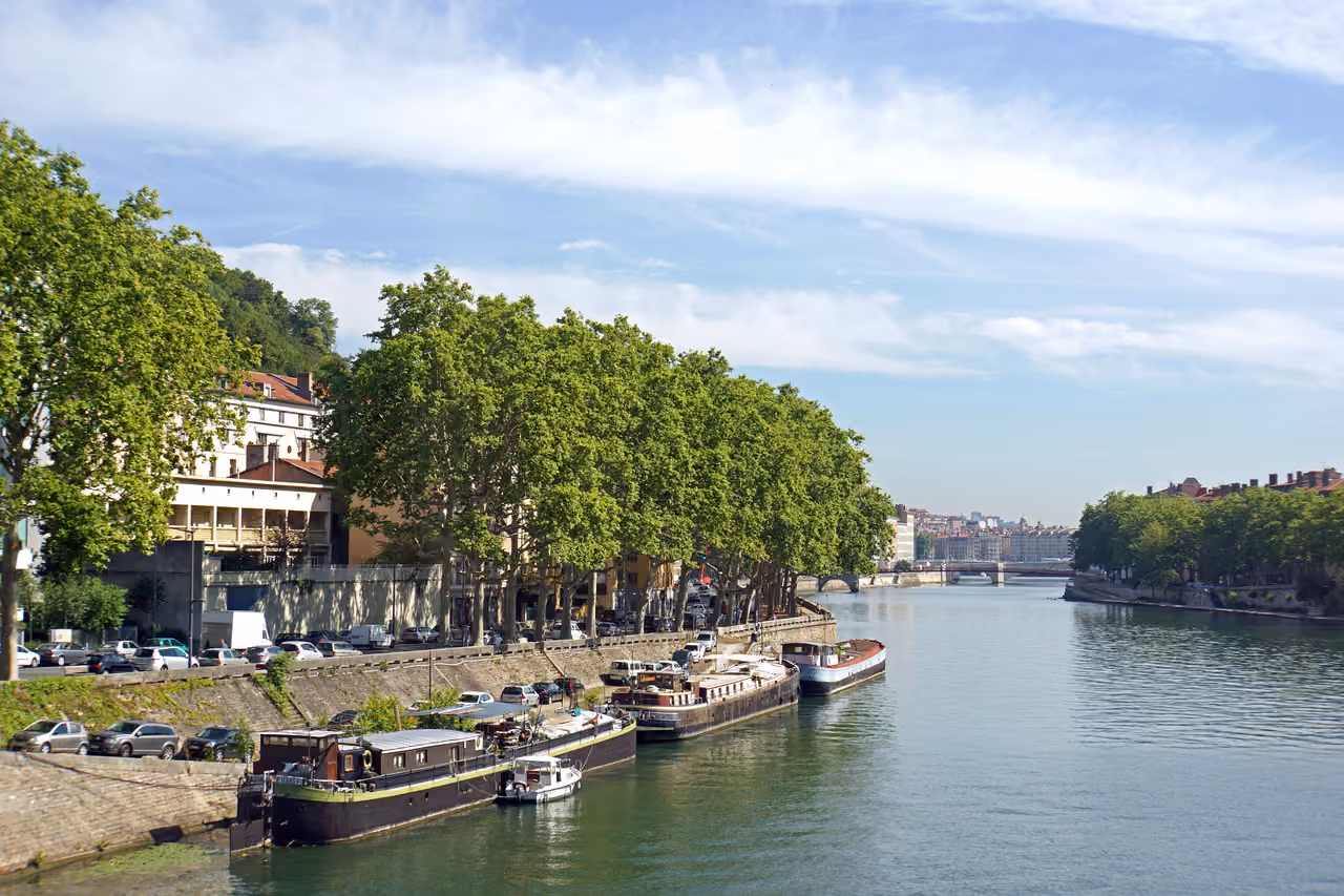 River boats moored along the banks of the Saone River