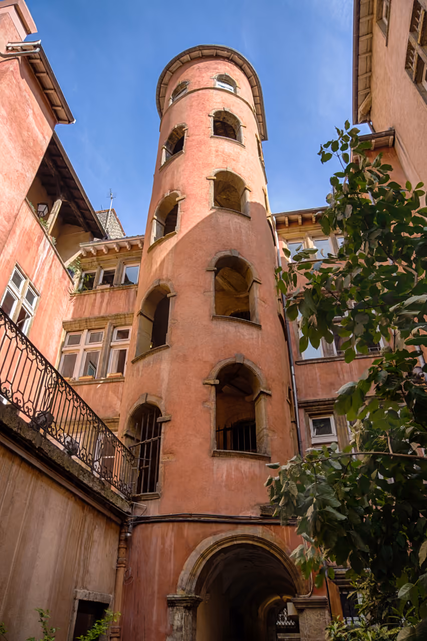 The pink Tour Rose (Pink Tower) inside a historic courtyard traboule in Vieux Lyon district