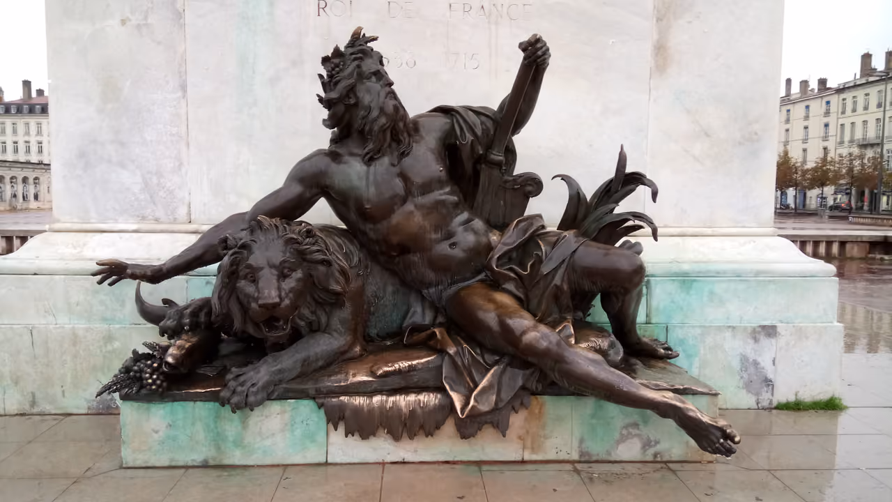 Bronze allegory of the Rhône River sculpture by Guillaume Coustou at Place Bellecour