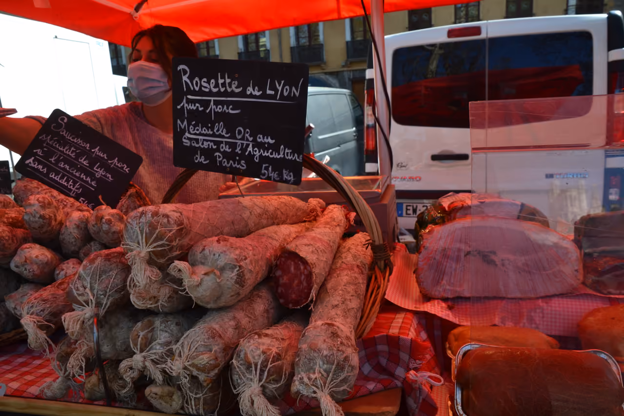 French cured meats and Rosette de Lyon sausage on display at the Saint Antoine market