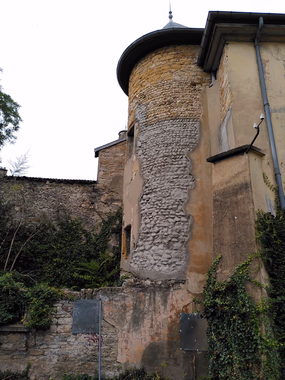 Stone tower and exterior walls of the historic Chateau de la Motte
