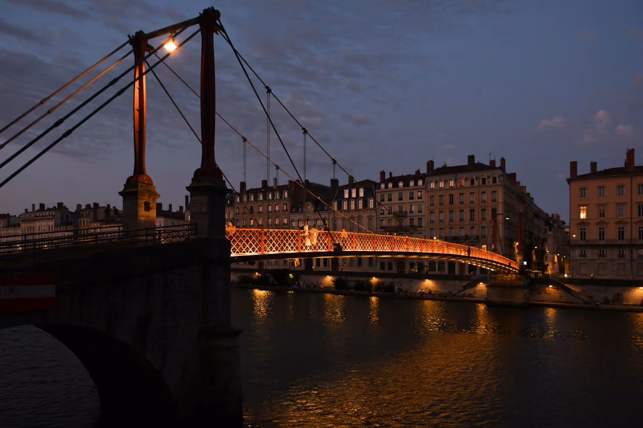 Illuminated Passerelle Saint-Georges footbridge at night
