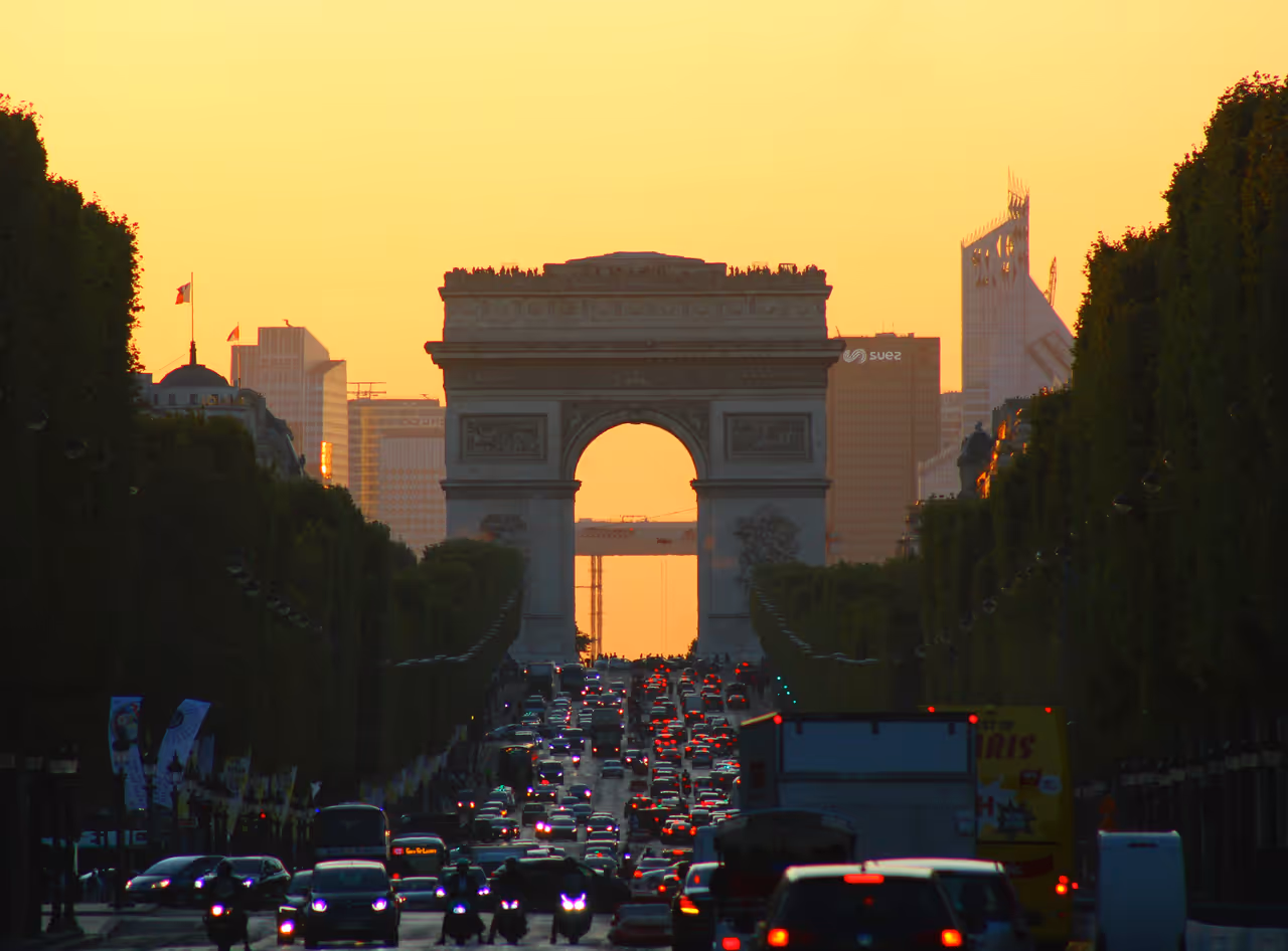 Arc de Triomphe at sunset, seen from the Place de la Concorde in Paris