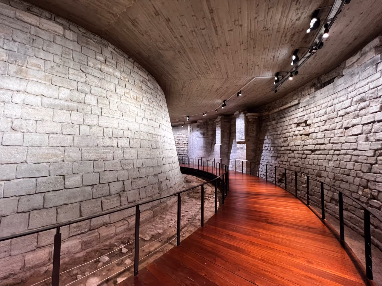 Louvre museum in Paris, brick walls inside the museum