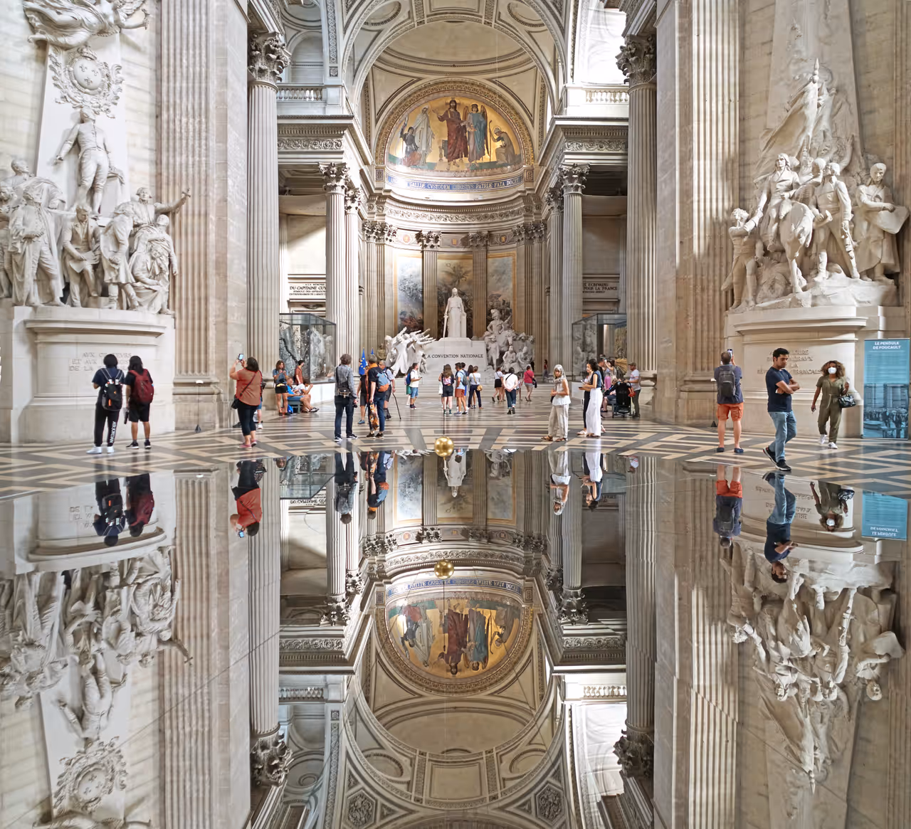 A large mirror placed on the floor beneath the Foucault pendulum inside the Panthéon