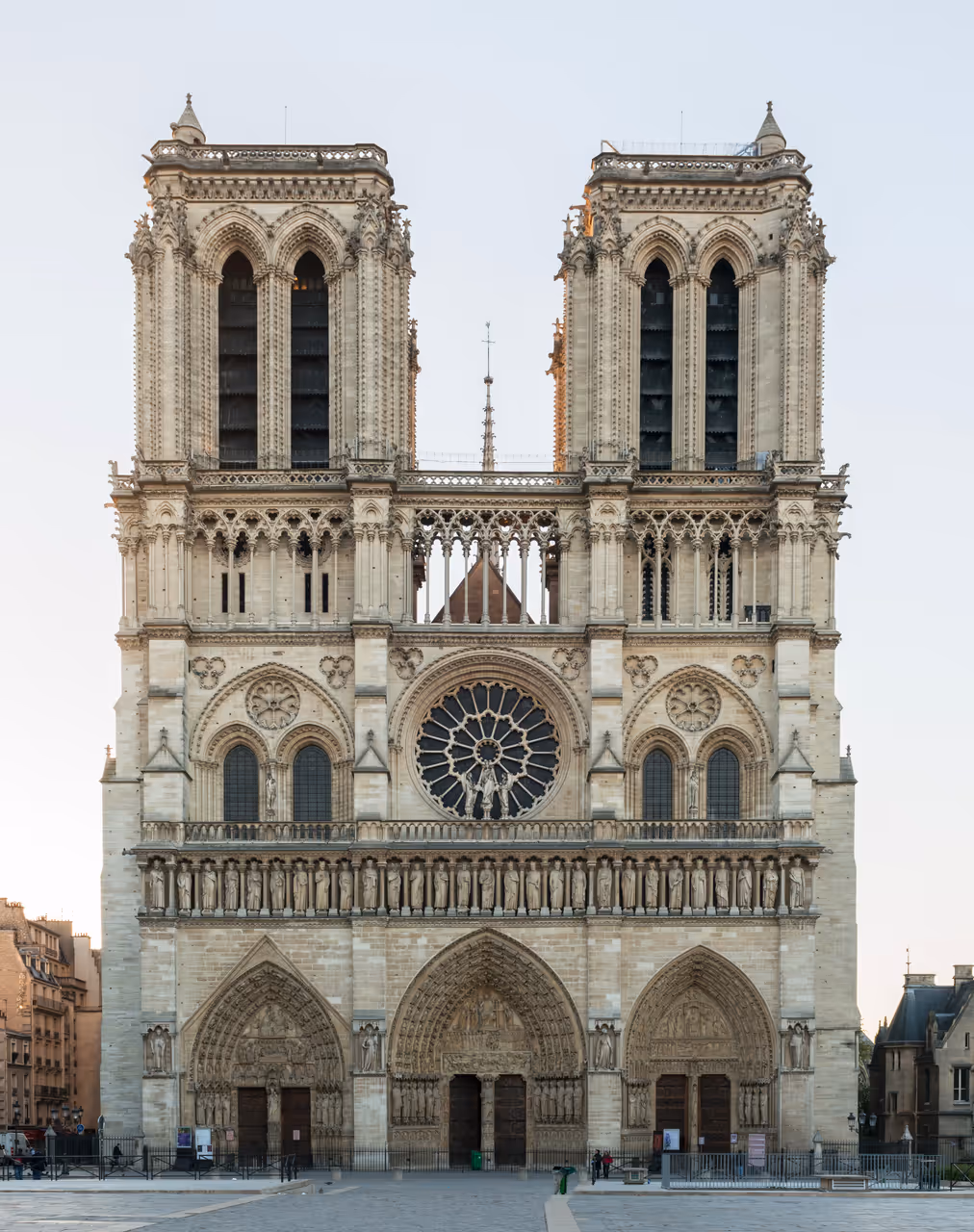 The west facade of Notre Dame de Paris during sunrise