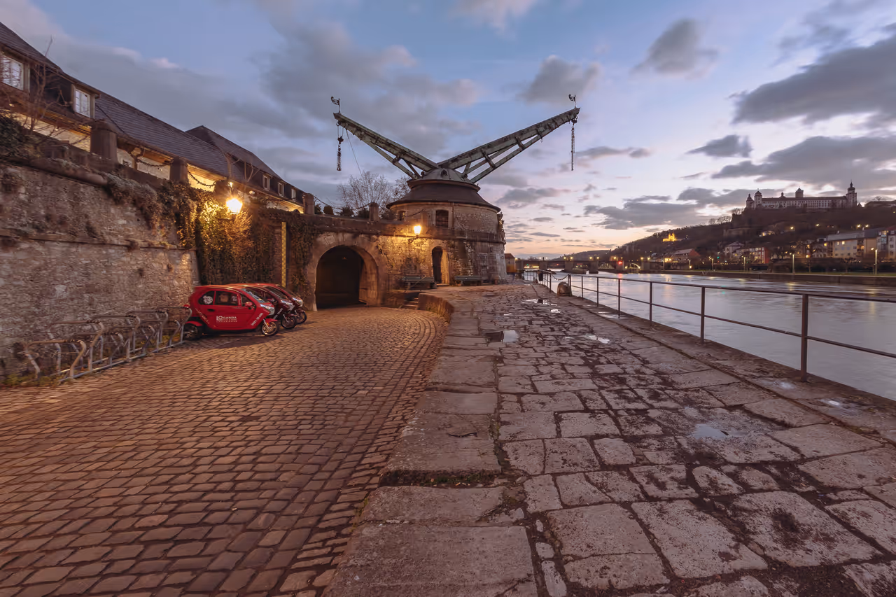Old crane in Würzburg at dusk