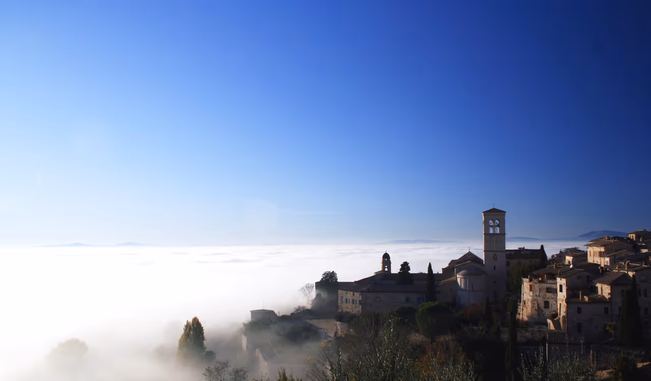 View of Assisi covered in fog