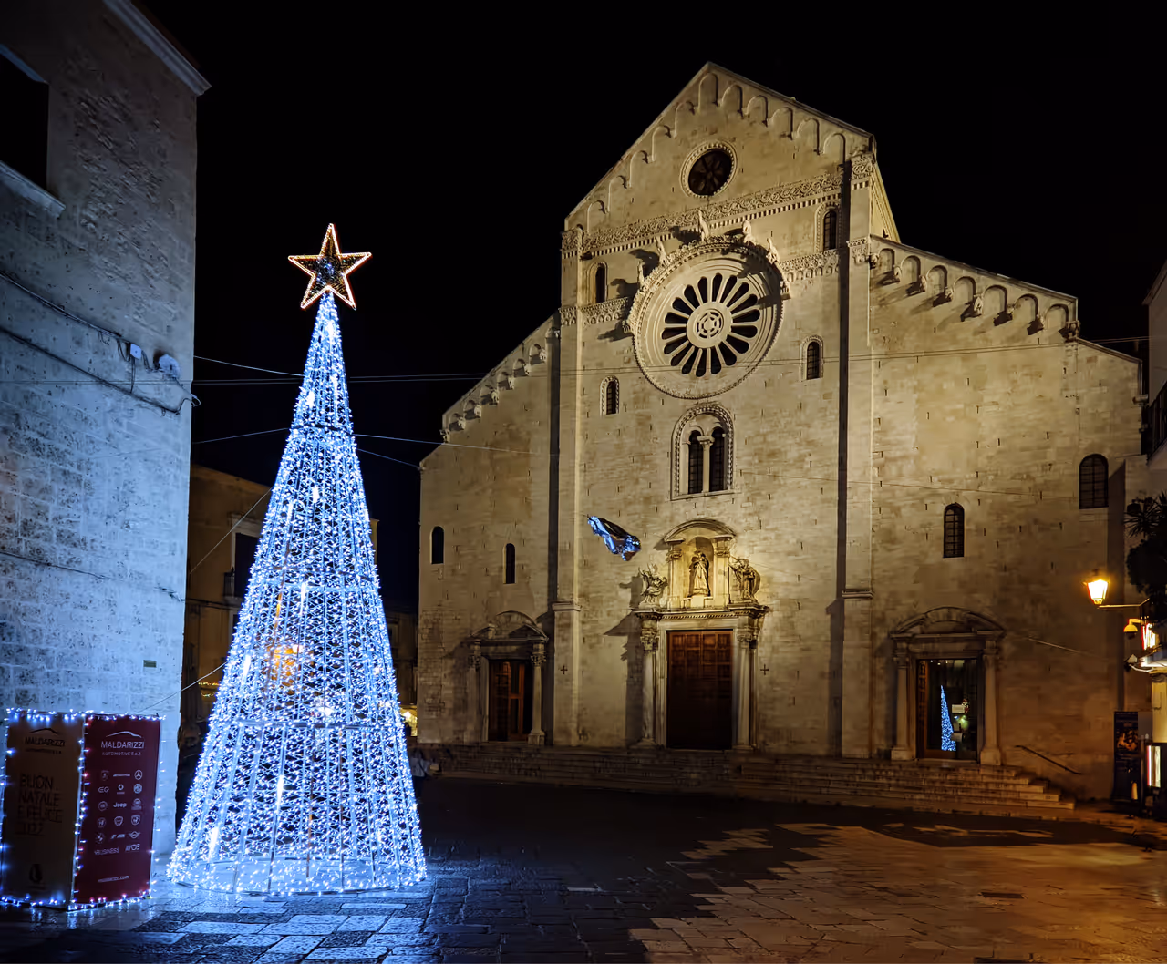 Outside cathedral in Bari with a christmas tree nearby