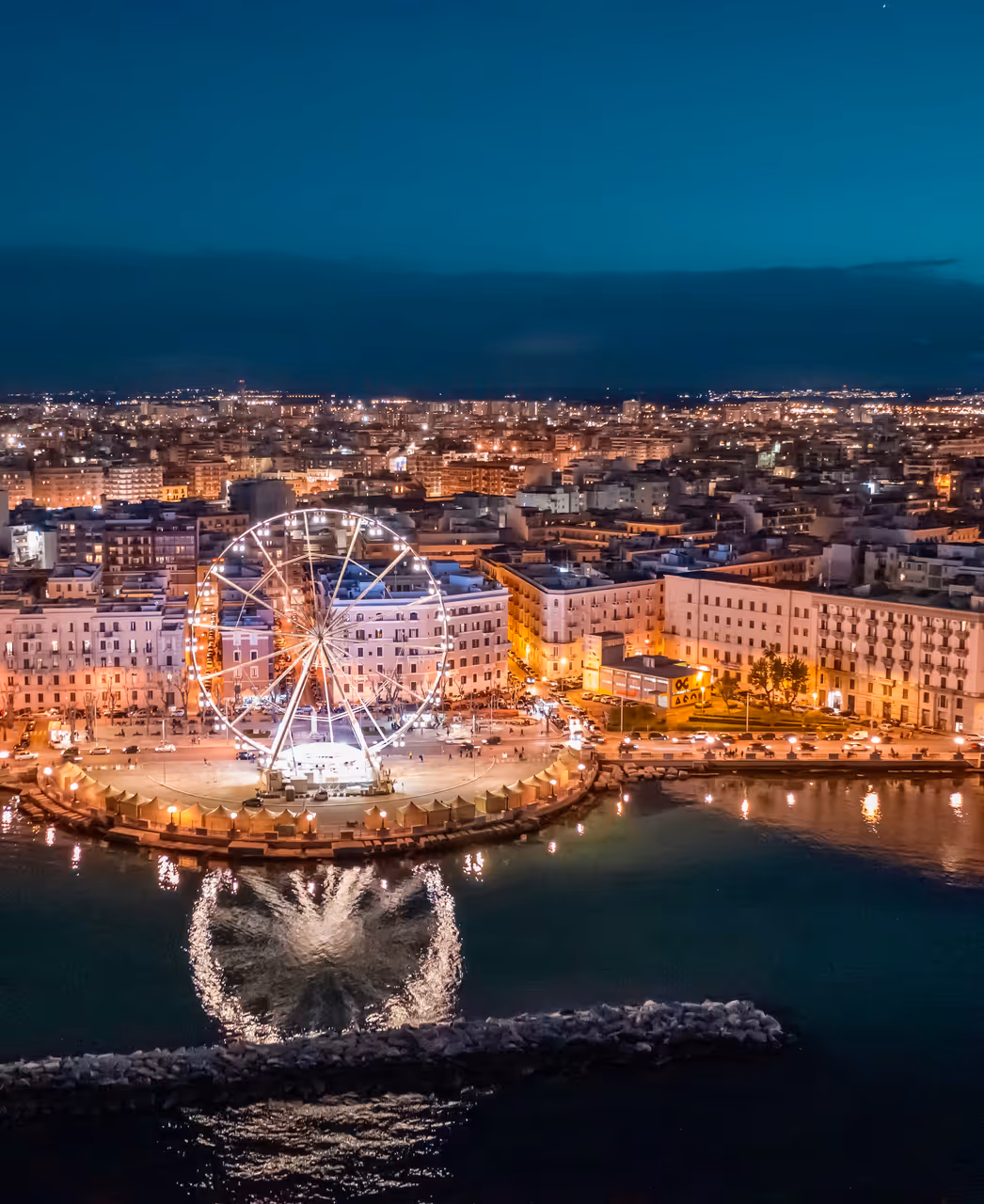 Bari ferris wheel lit up at night