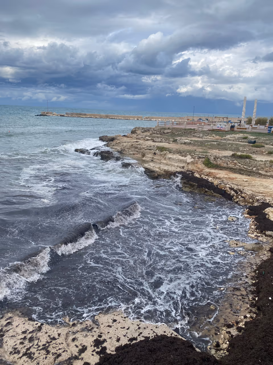 Sea water hitting rocks in Bari