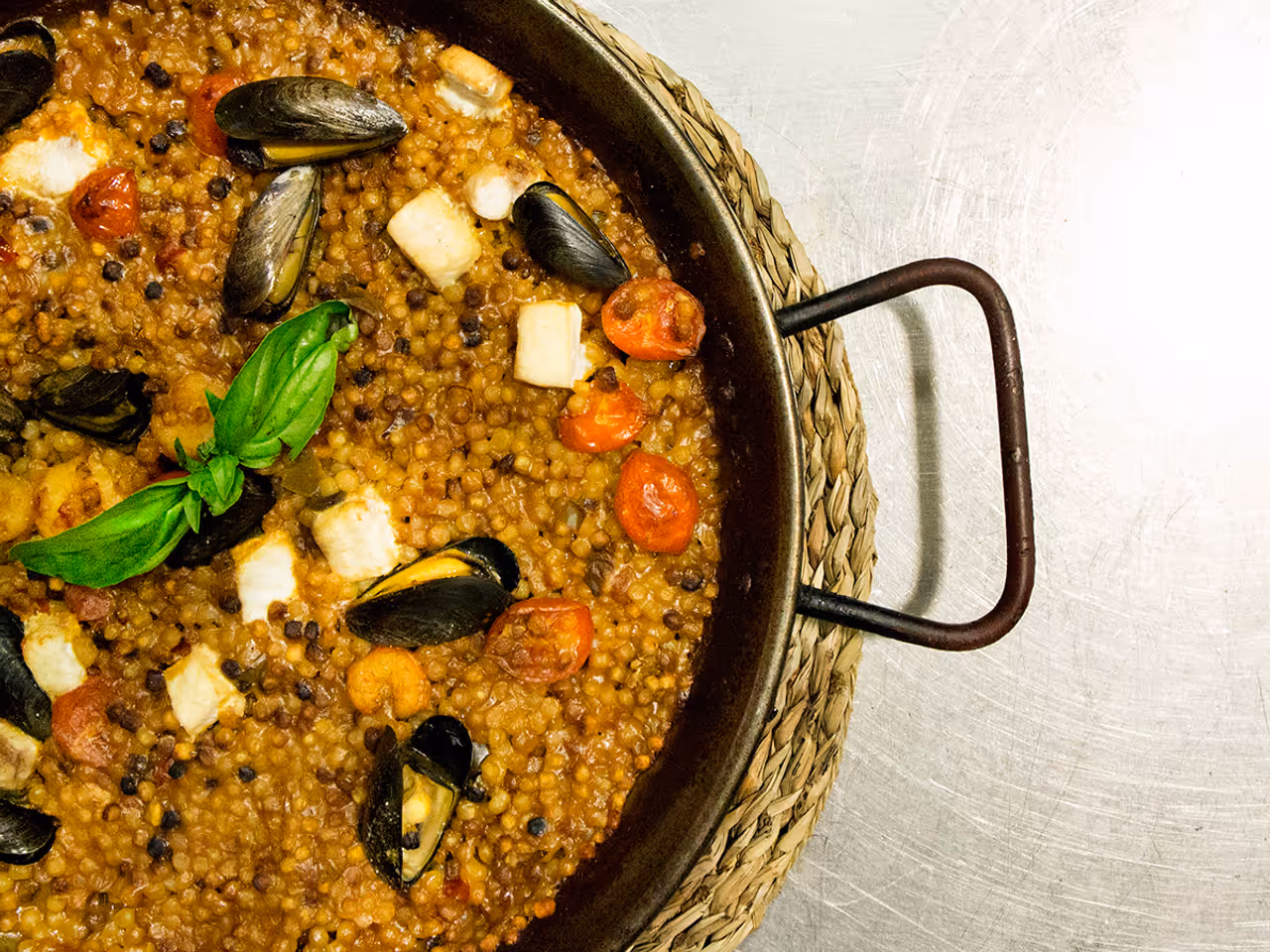Fregola with clams food in Cagliari