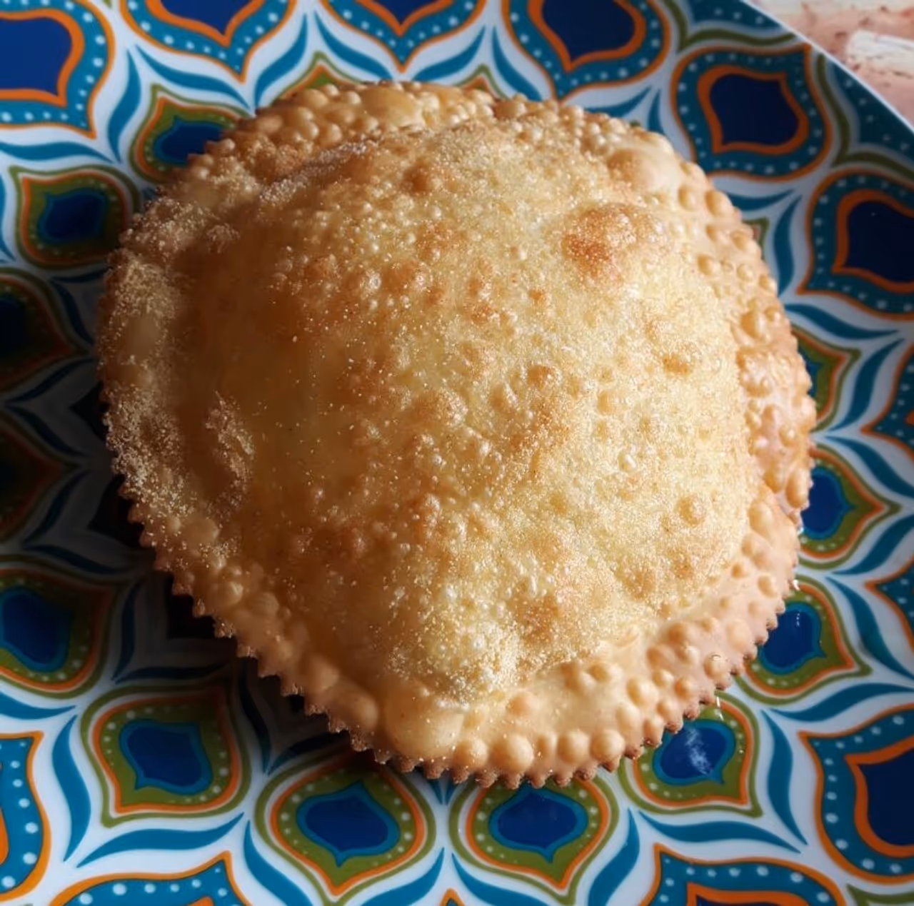 Honey-drenched cheese pastry food in Cagliari