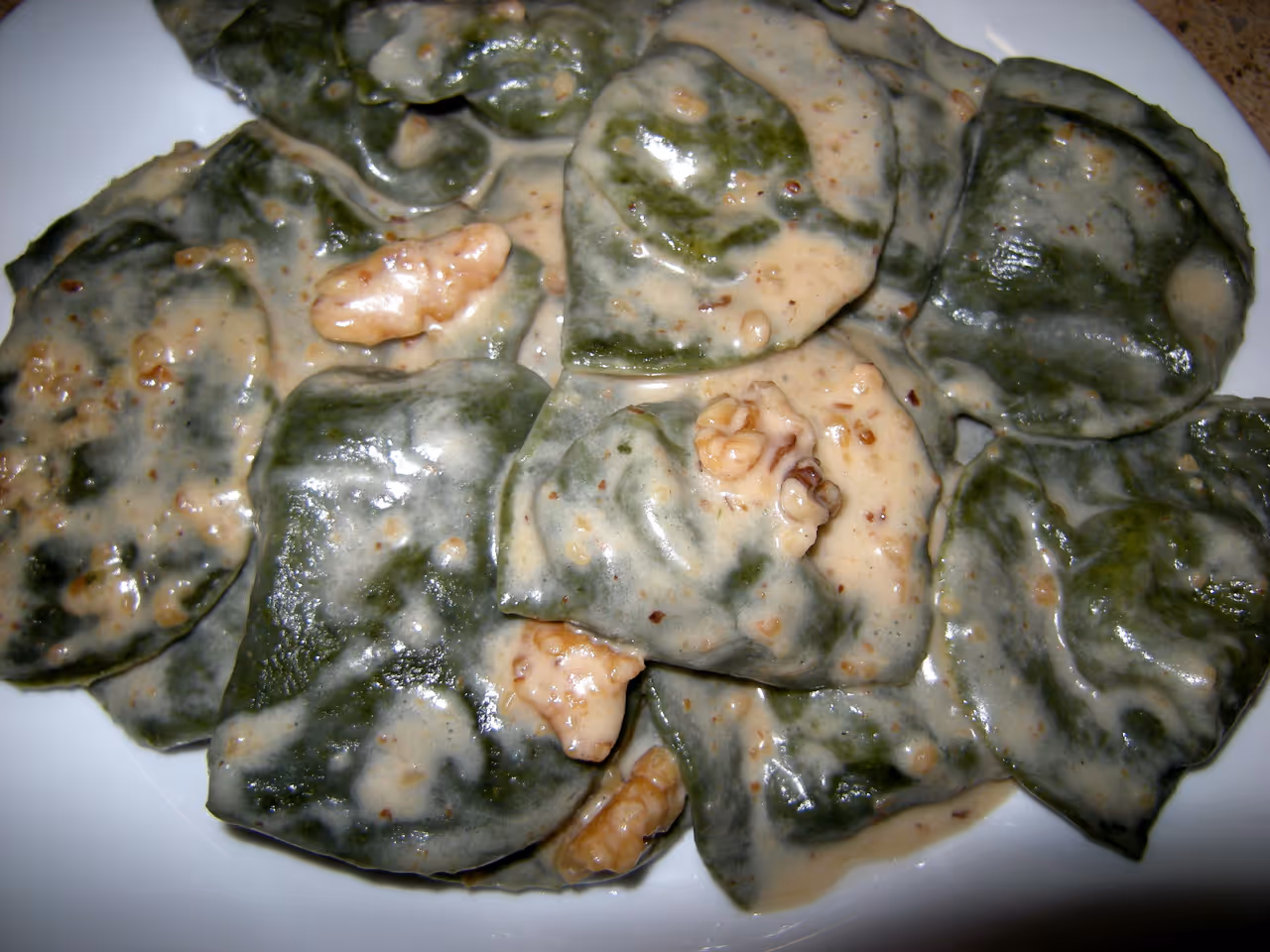 Stuffed pasta with walnut sauce food in Genoa