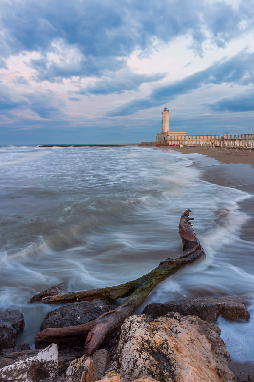 The San Cataldo lighthouse with a rough sea
