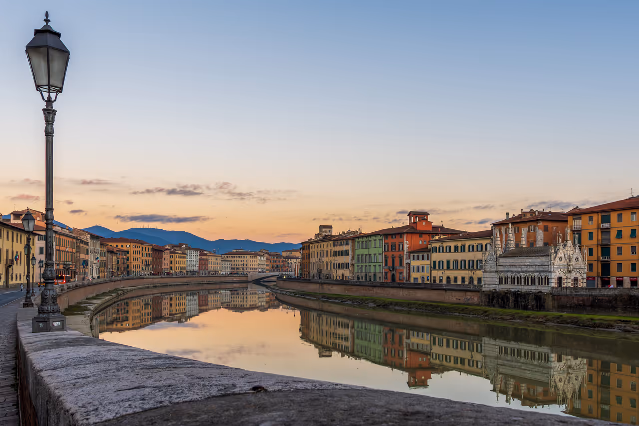 Walking the river promenades free activity in Pisa