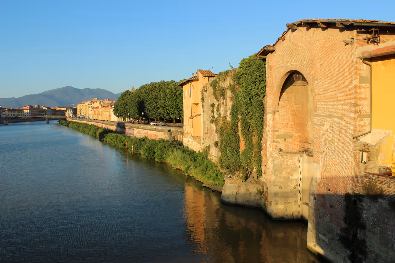 Walking the river promenades free activity in Pisa