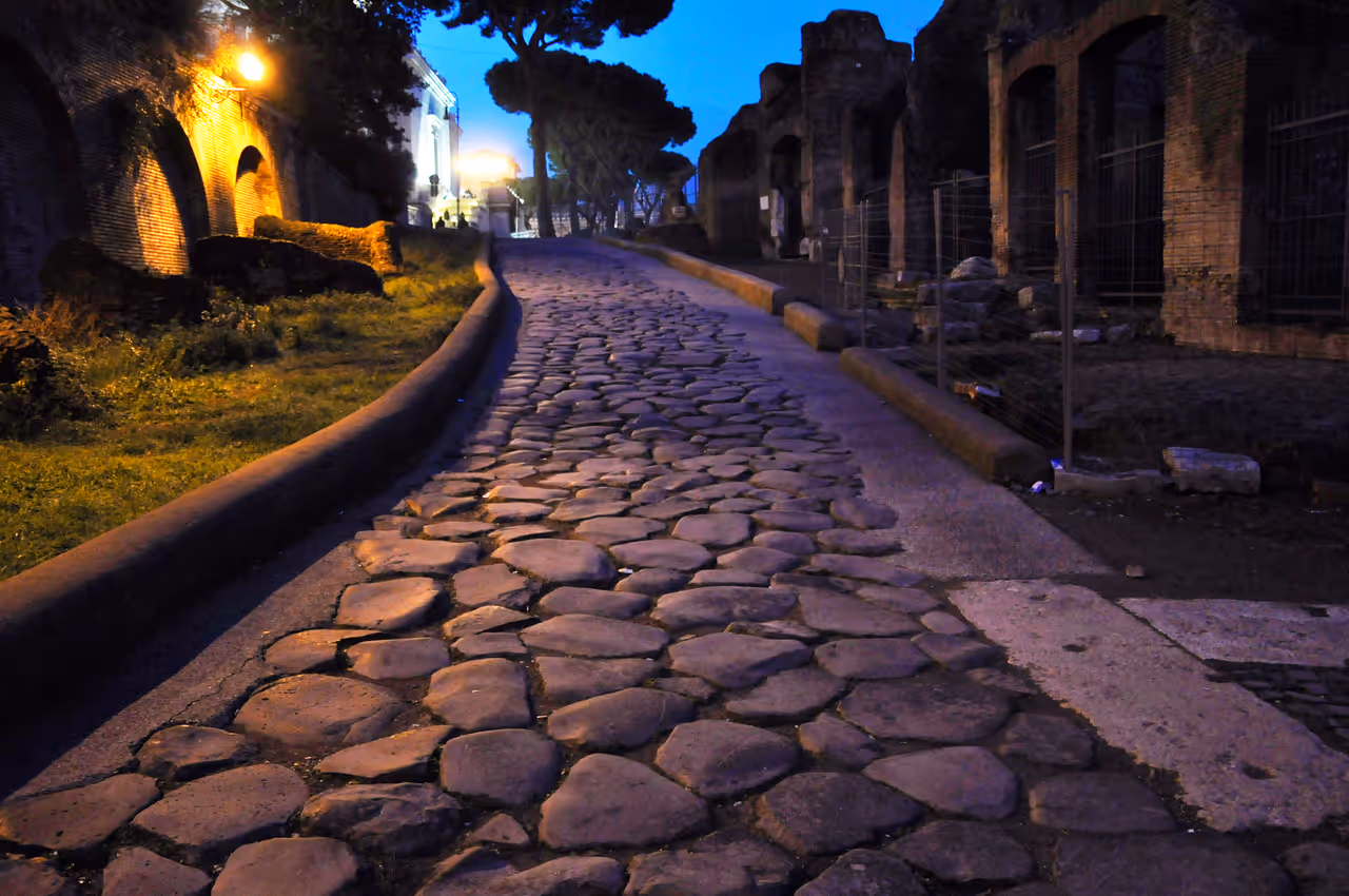 Roman forum road at night in Rome