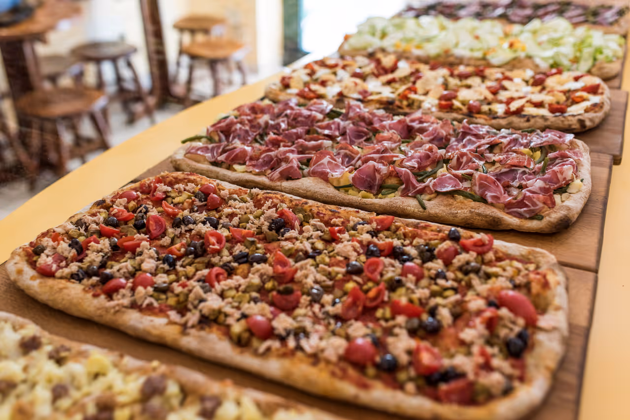 Pizza by the slice food in Rome