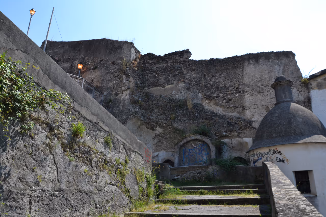 Portion of the walls of Salerno along the facade of the Montevergine convent