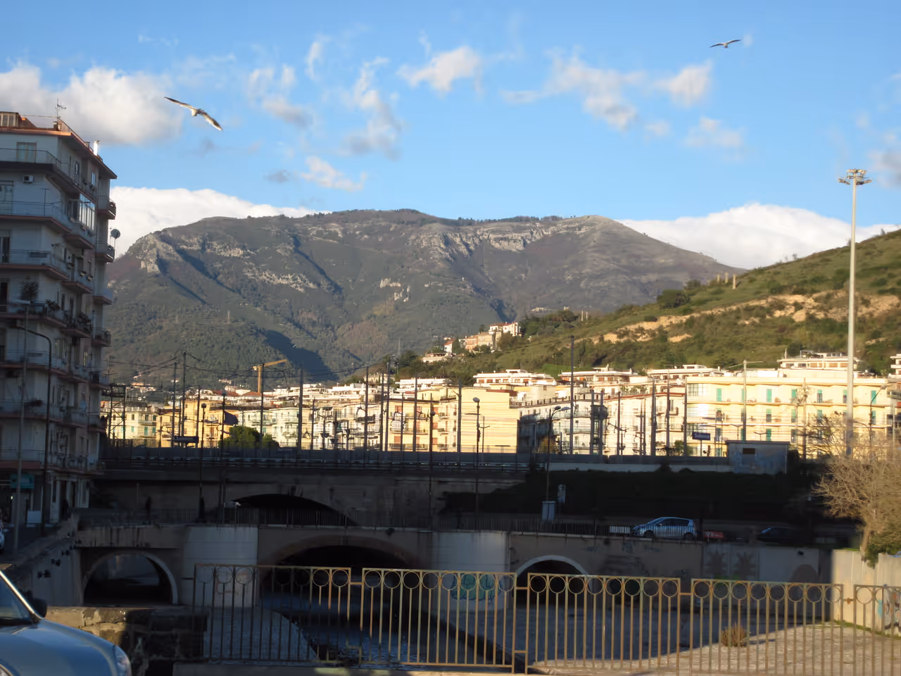 Monte Stella, seen from the Salerno seafront; below, the Irno River
