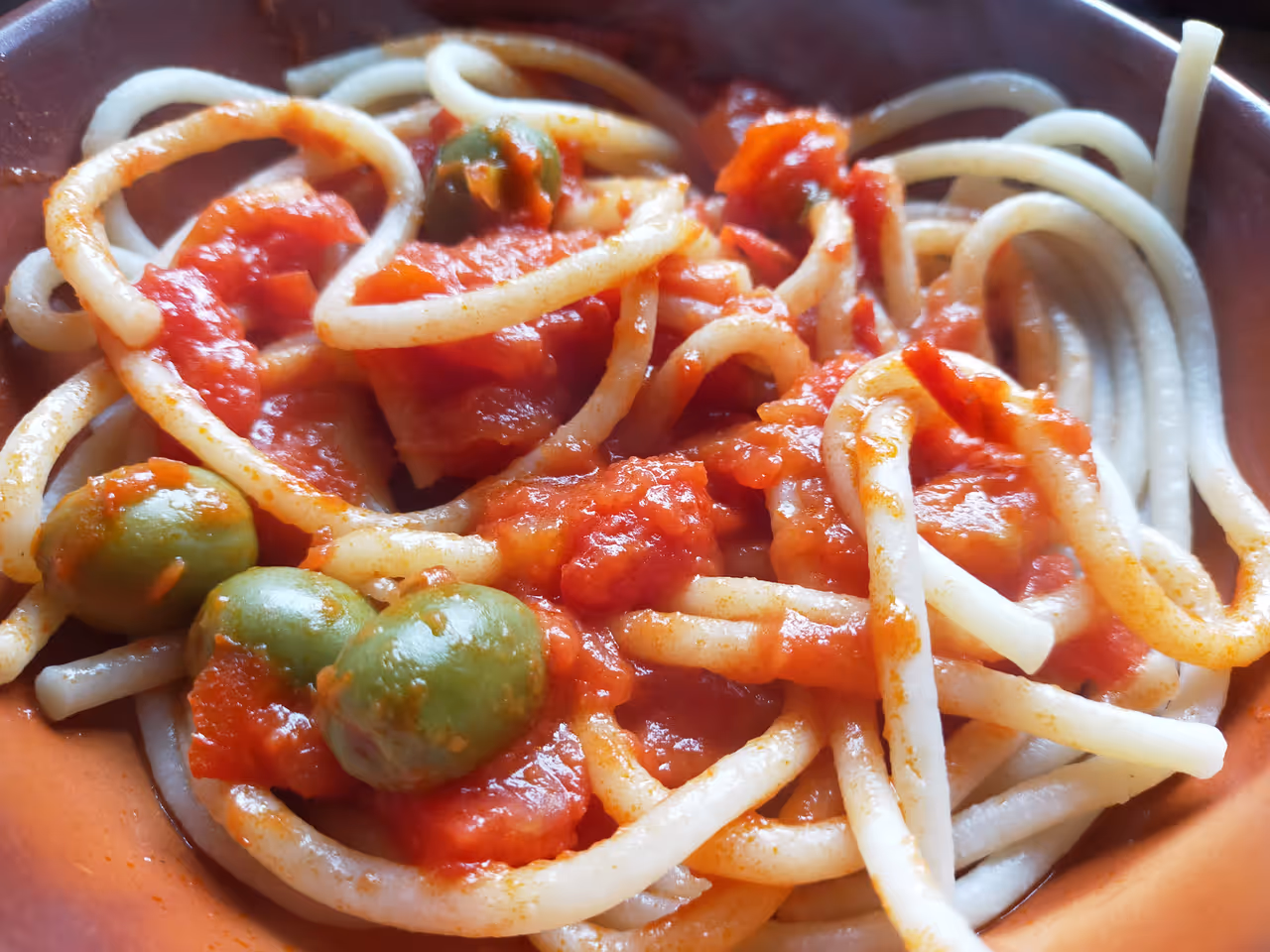 Pici pasta with garlic sauce food in Siena