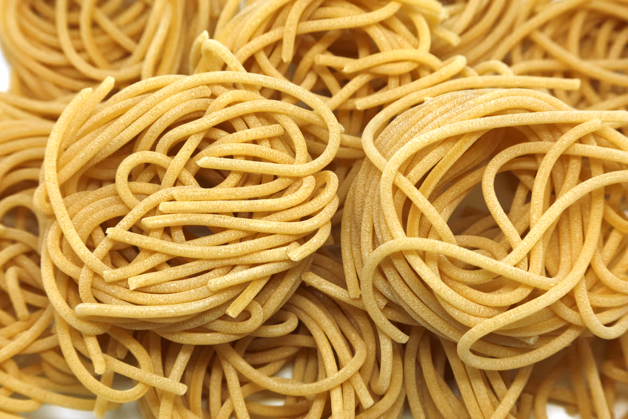 Pici pasta with garlic sauce food in Siena